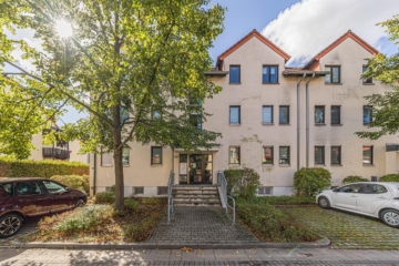 Eigentumswohnung | Blick zum Gebäude - NEU: Charmante Maisonette mit Balkon und Garten