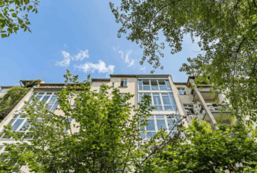 Eigentumswohnung | Fassade - Gartenseite - NEU: Vermietete Eigentumswohnung in Schleußig – Attraktive Investitionschance