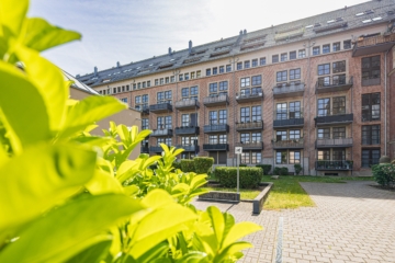 Eigentumswohnung | Blick zum Gebäude - NEU: Wohnen mit Weitblick: Maisonette im Denkmal mit West-Balkon
